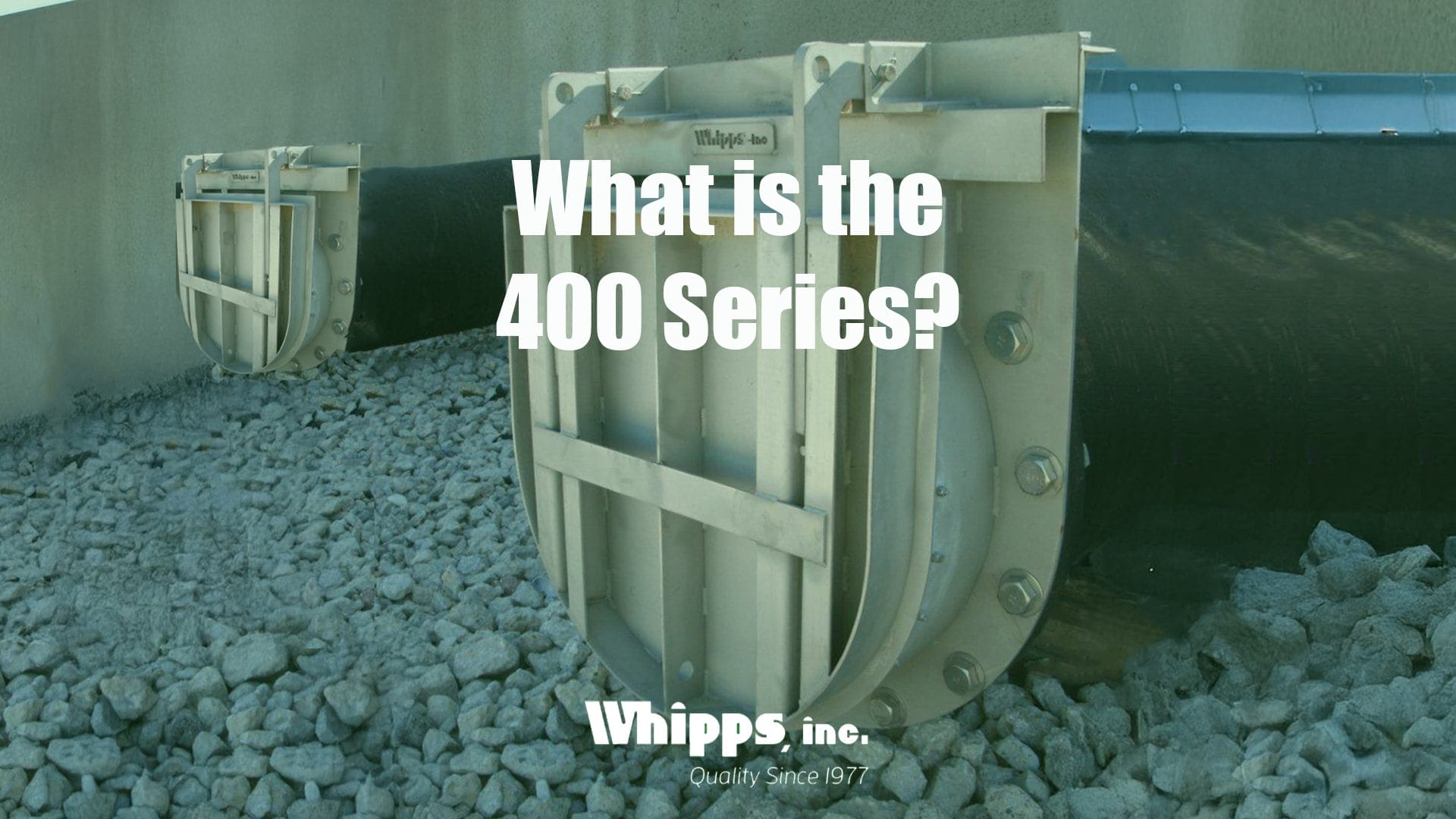 Close-up of Whipps, Inc.'s 400 Series Flap Gates installed on a drainage system, designed for precision water flow control and preventing backflow.