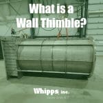 A large stainless steel wall thimble gate assembly sits in a factory setting, prepared for installation. Text overlay reads: "What is a Wall Thimble?" with the Whipps, Inc. logo and the tagline "Quality Since 1977."